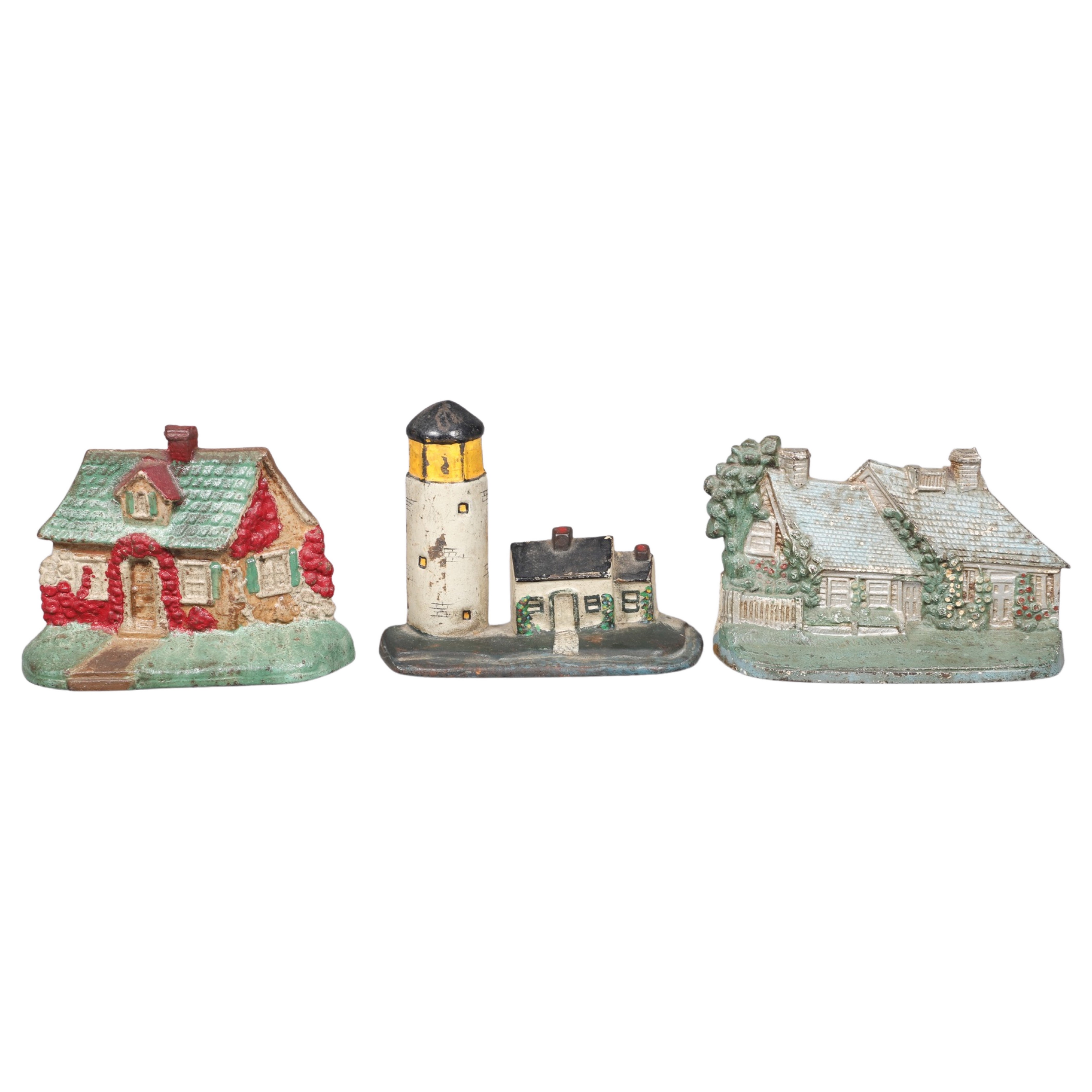 (3) Cast iron doorstops, c/o