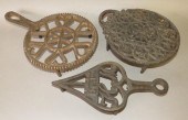 3 CAST IRON FIGURAL FOOTED TRI
