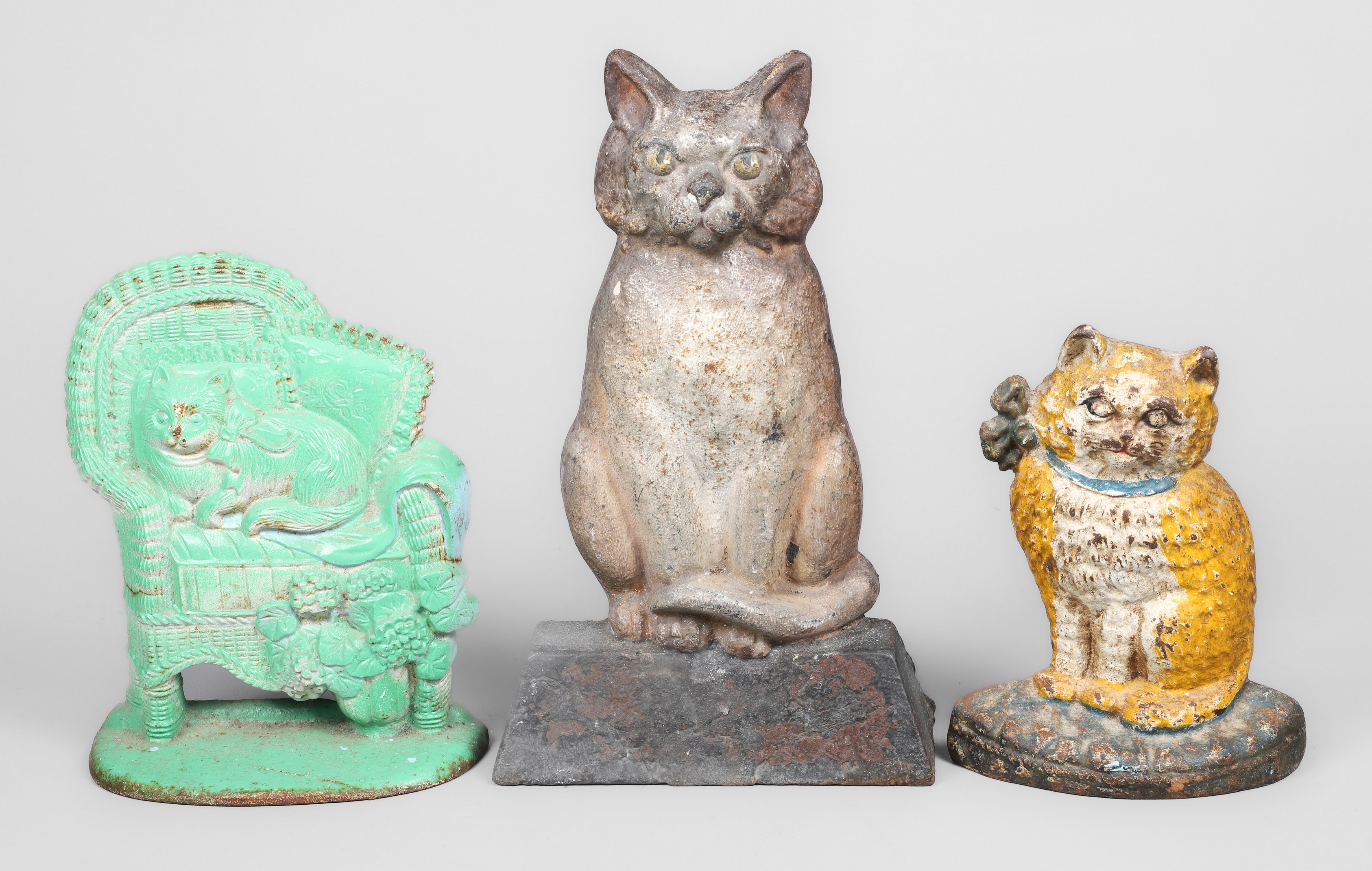 (3) Cast iron flat cat doorstops,
