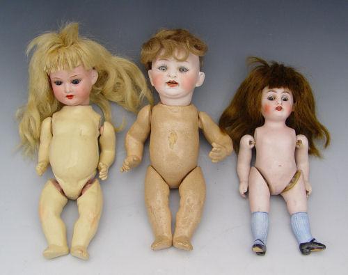 3 GERMAN BISQUE HEAD DOLLS: 1)