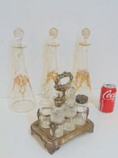 3 GILT DECORATED DECANTERS & C