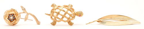 3 LADIES' GOLD BROOCHES: FLOWER,