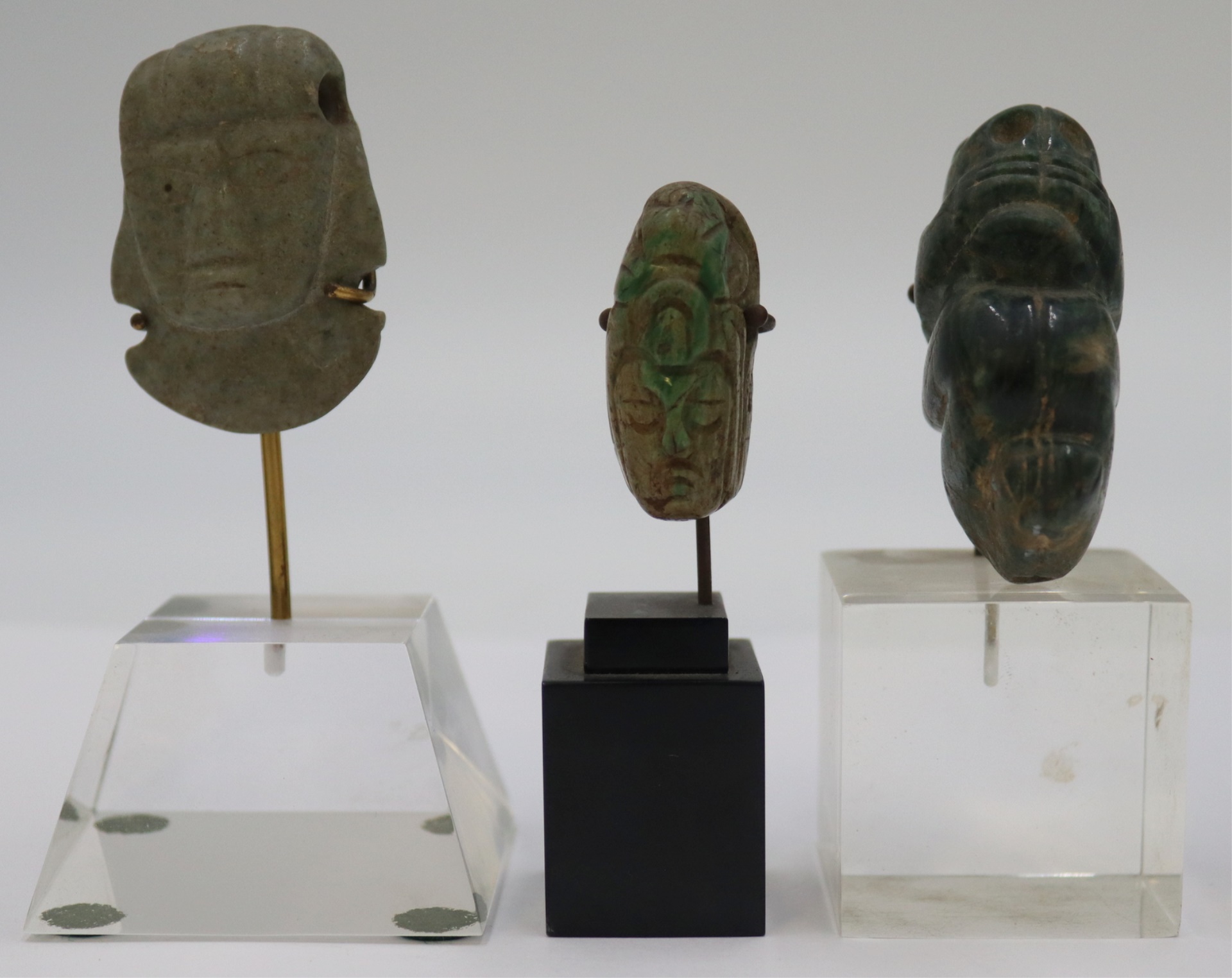 (3) MAYAN CARVED STONE PENDANTS.