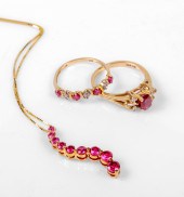 (3) Pink stone gold rings and