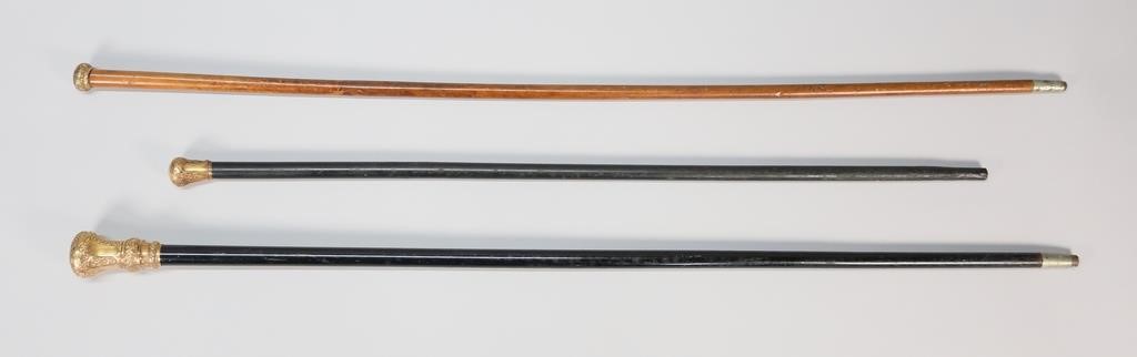3 PRESENTATION CANES WITH ROLLED