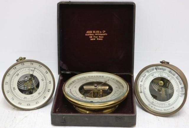 3 ROUND BRASS BAROMETERS.  1 MARKED