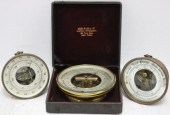 3 ROUND BRASS BAROMETERS.  1 M
