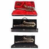 (3) saxophones, surface scratc