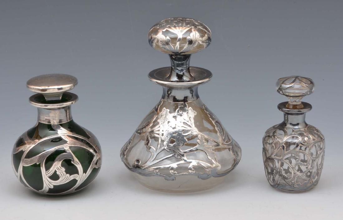 3 SILVER OVERLAY PERFUME BOTTLES.
