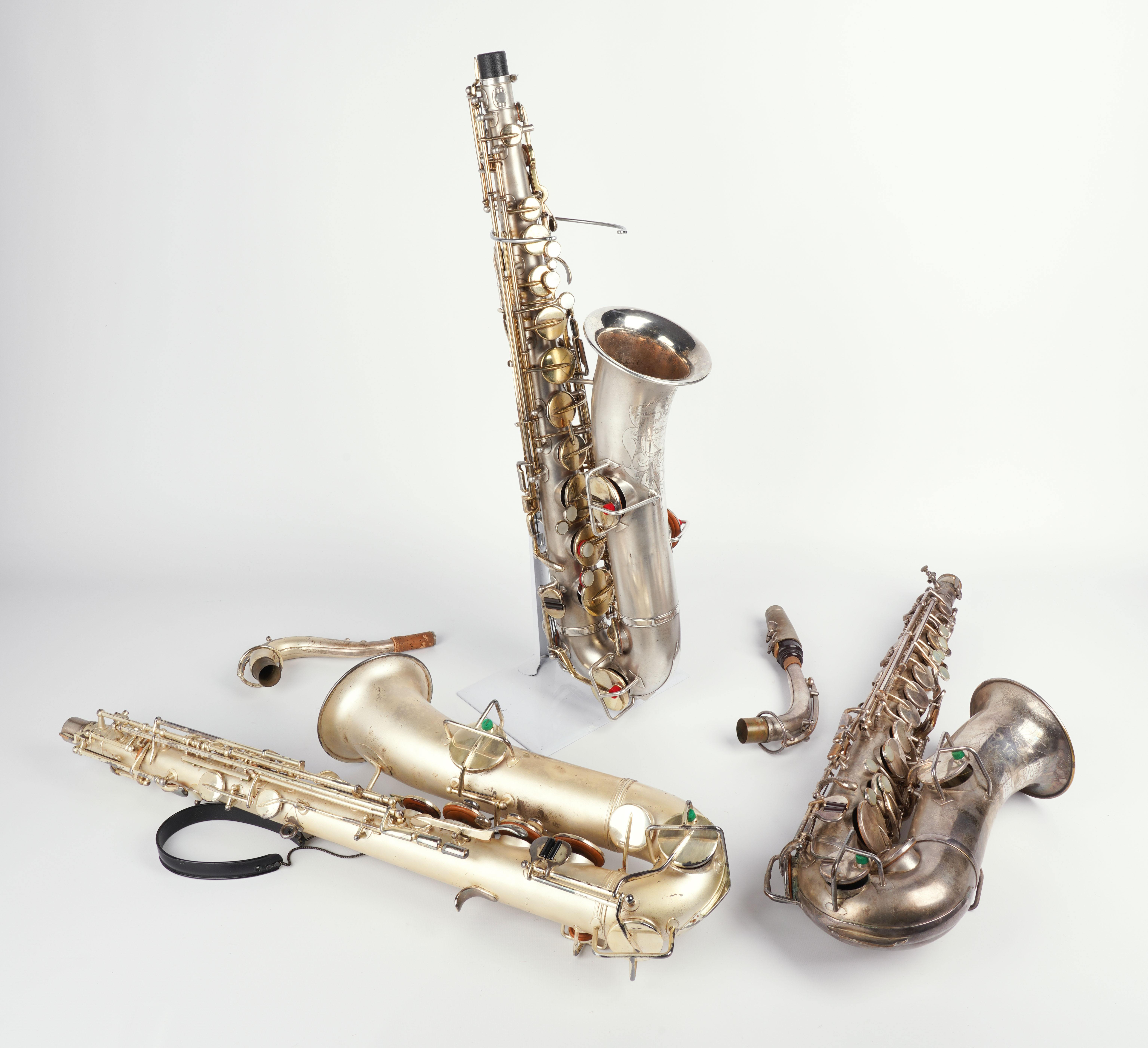 (3) Silver plate alto saxophones,