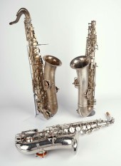 (3) Silver plate saxophones, c