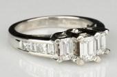 3 STONE EMERALD CUT DIAMOND RI