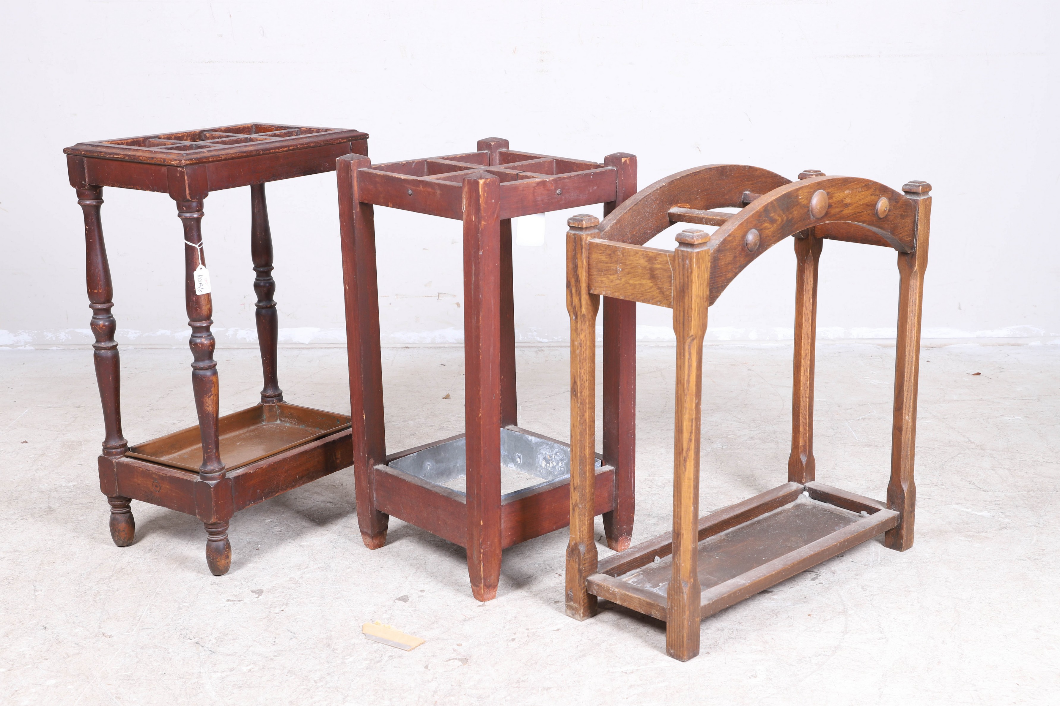 (3) Umbrella stands, all with metal