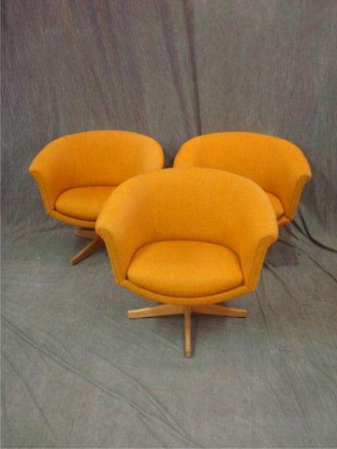 3 Upholstered Swivel Chairs.
