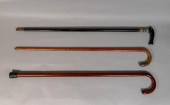 3 WOODEN CANES3 wooden canes.