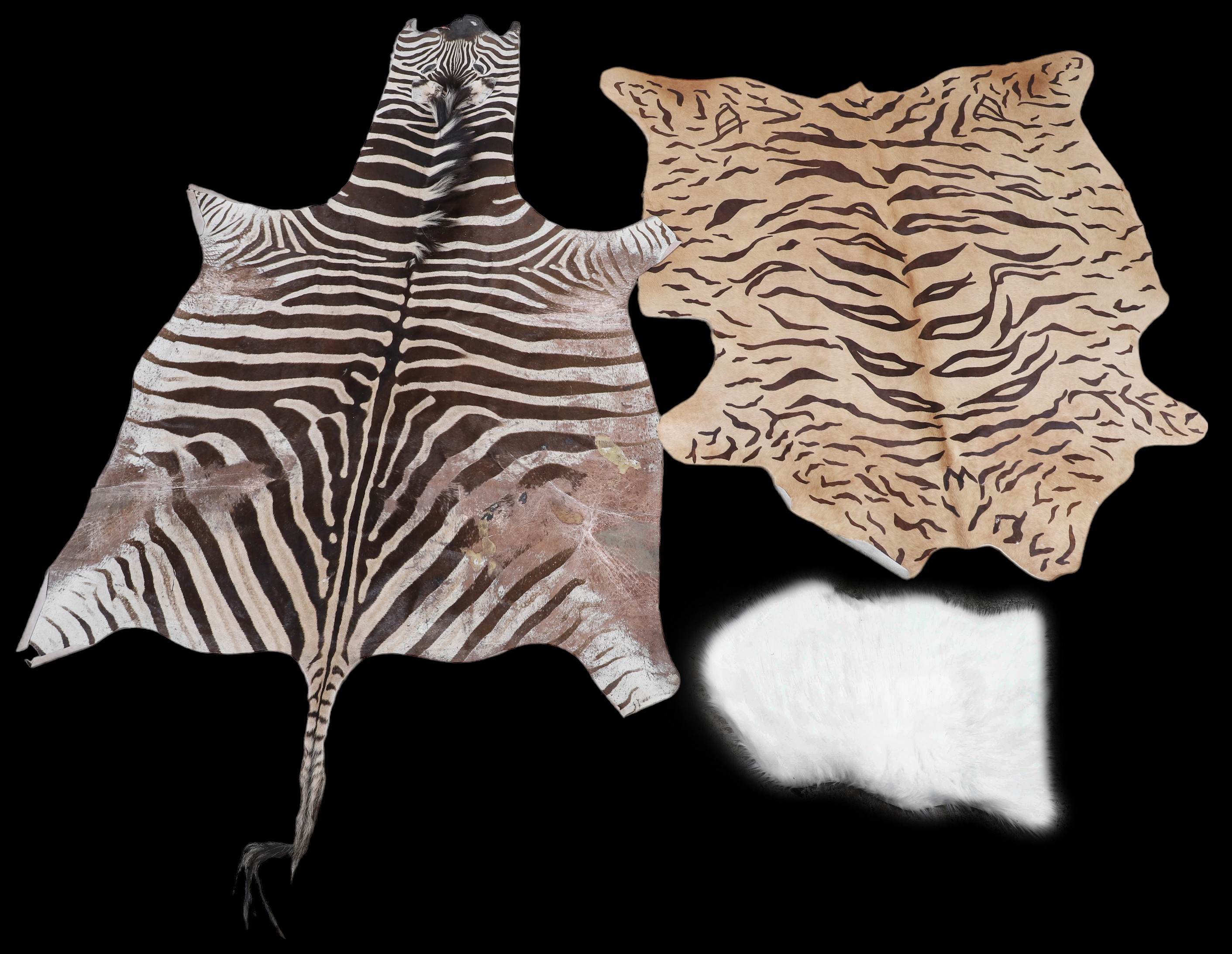 (3) Zebra and cowhide rugs to