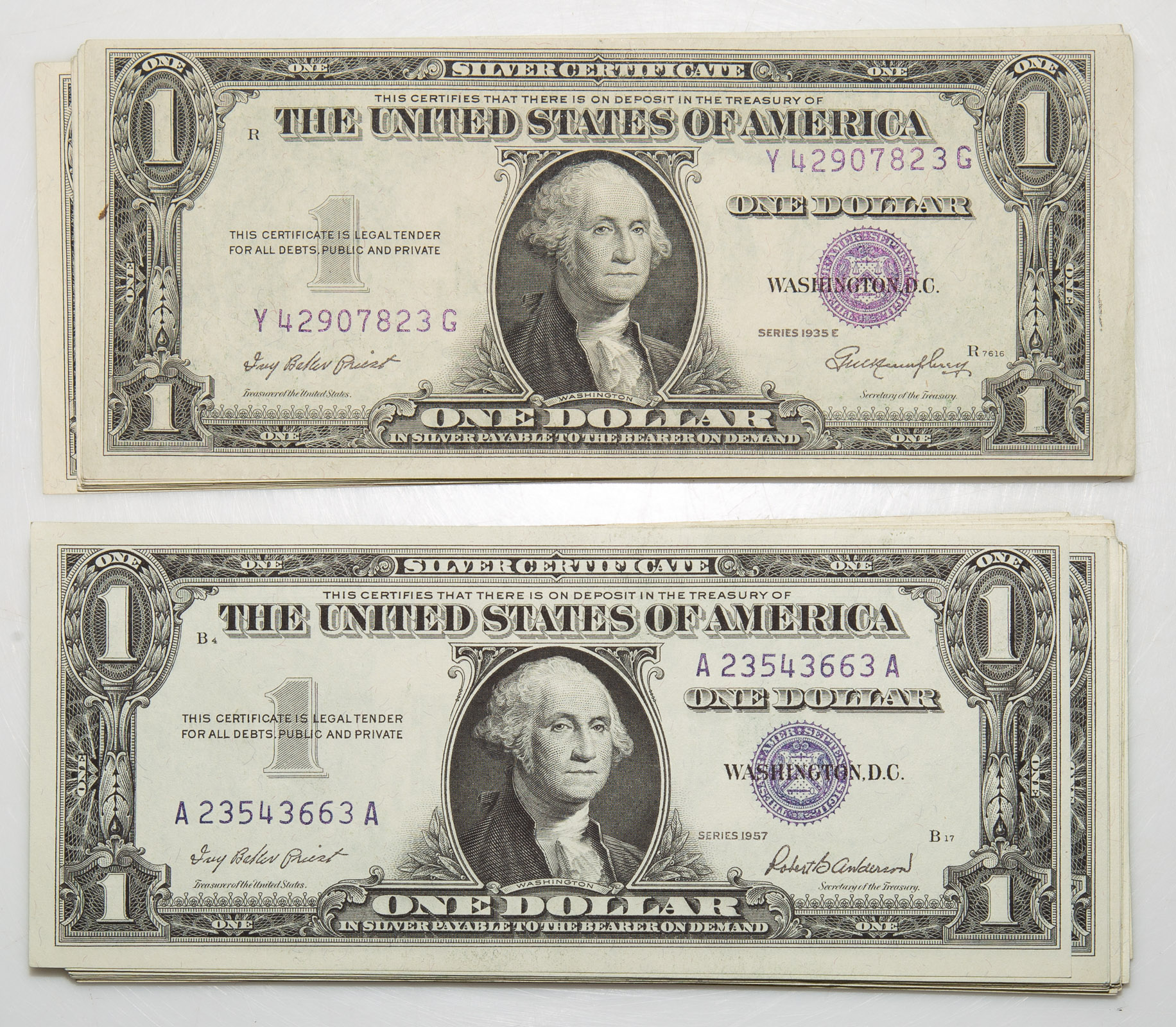 31 - 1957 AU/UNC $1 SILVER CERTS