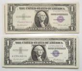 31 - 1957 AU/UNC $1 SILVER CER