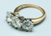 3.3 ct. triple diamond ring, t