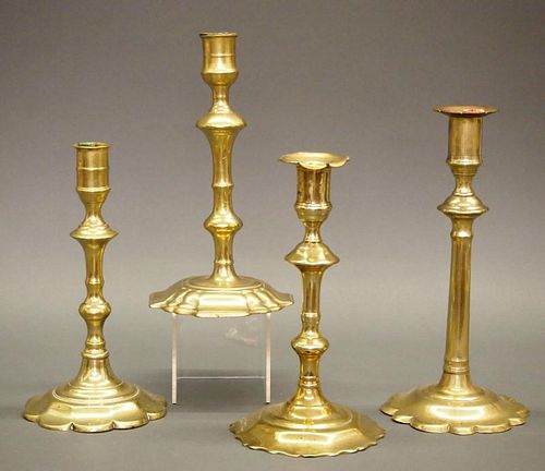4 18TH C BRASS CANDLESTICKSA lot of