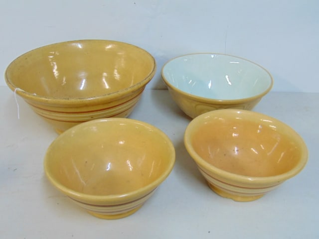 4 BANDED YELLOW WARE BOWLS, LARGEST
