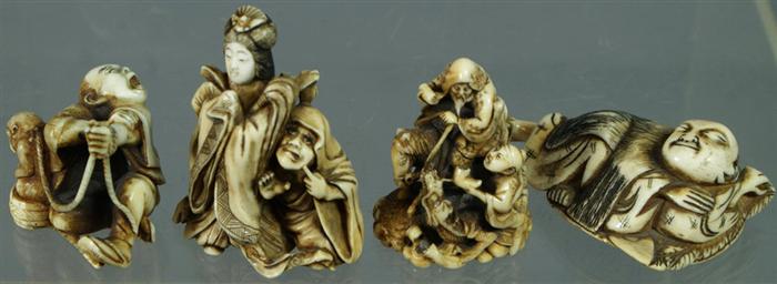 4 carved ivory figural netsuke,