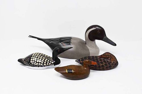 4 CARVED WOODEN DUCKS4 carved