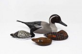 4 CARVED WOODEN DUCKS4 carved