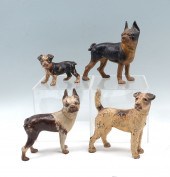 4 CAST IRON DOG DOORSTOPS: Com