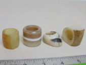 4 CHINESE ARCHER RINGS, CARVED
