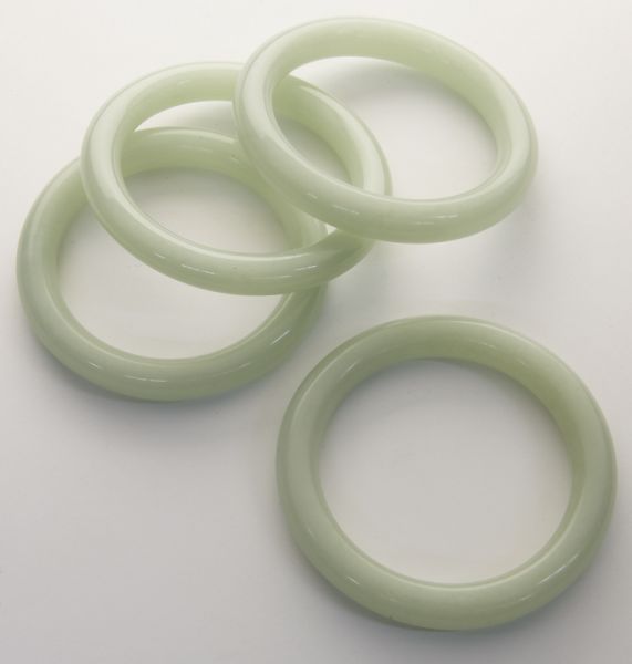 (4) Chinese jade bracelets.3'' Dia.