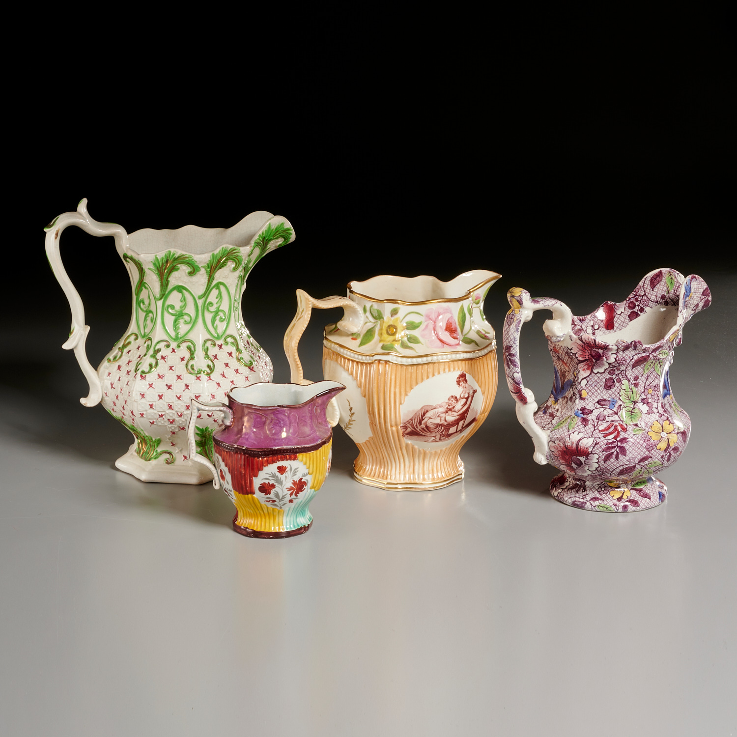 (4) ENGLISH IRONSTONE PITCHERS