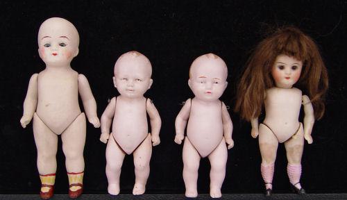 4 GERMAN BISQUE DOLLS: All bisque