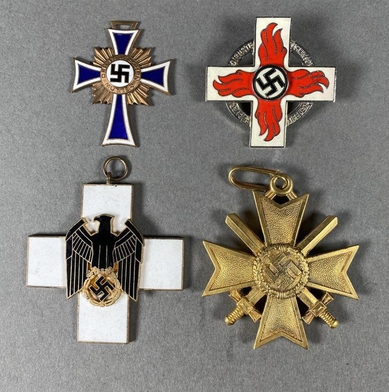 4 GERMAN WWII NAZI MEDALS/BADGESSee