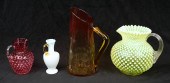 (4) Glass pitchers, c/o amberi