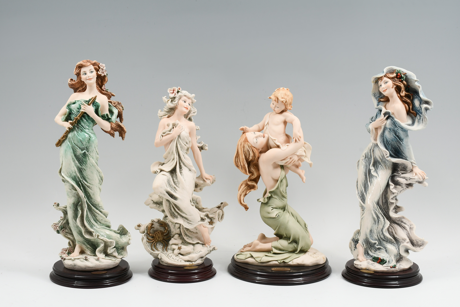4 GUISEPPE ARMANI FIGURES: Four