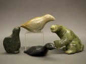 4 INUIT STONE CARVINGSFour Inu