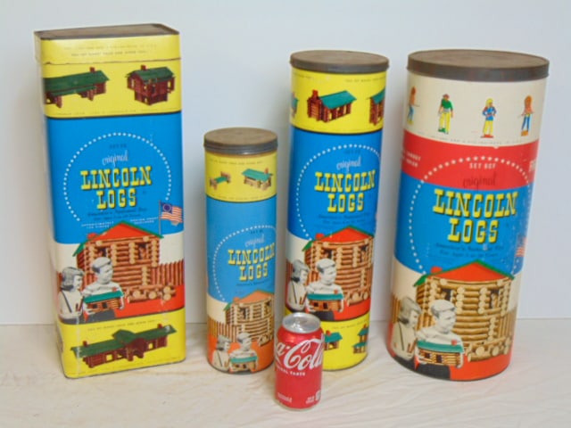 4 LARGE "LINCOLN LOGS" CANISTERS