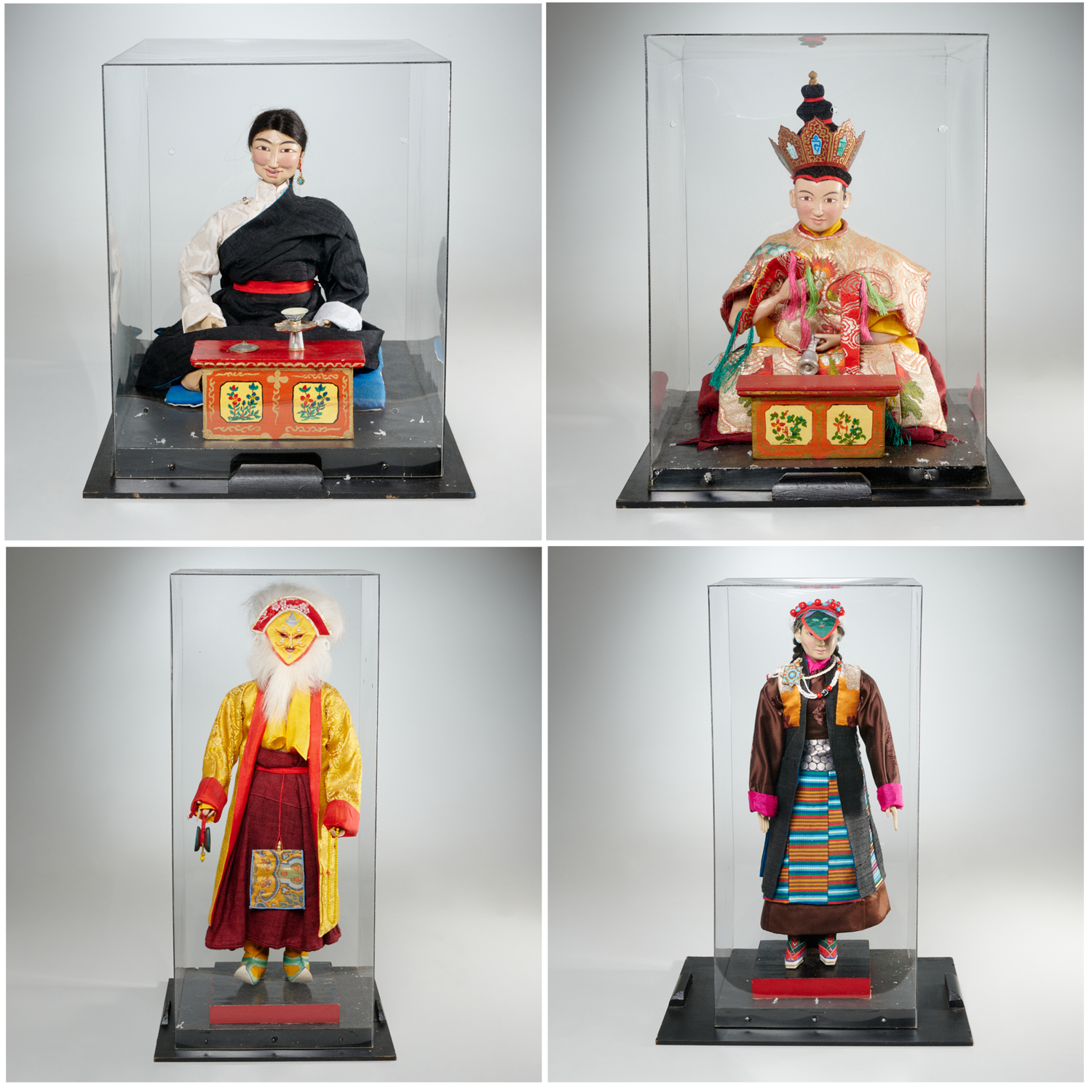 (4) LARGE TIBETAN COSTUMED FIGURES,