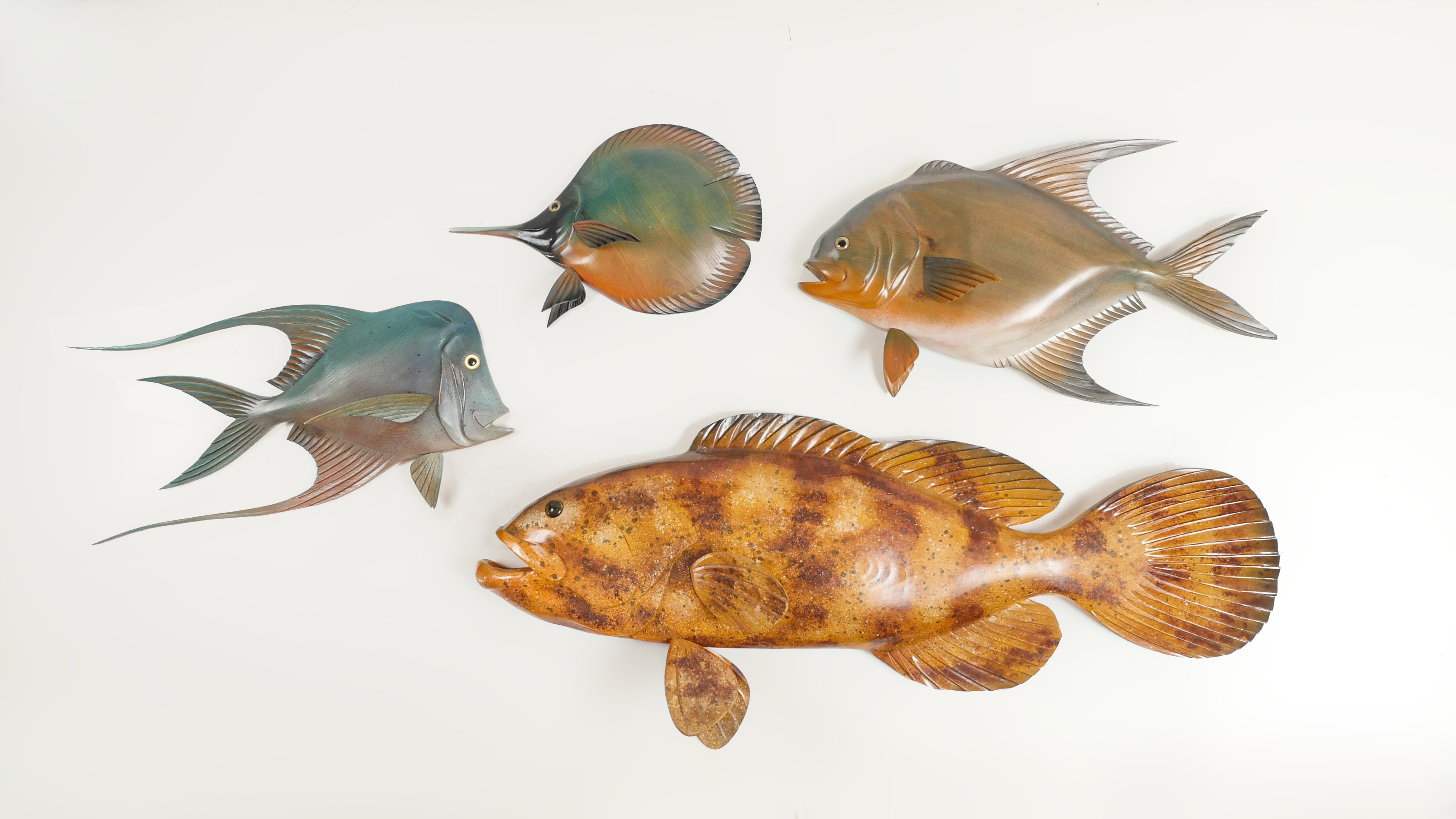 4 PC. CARVED FISH BY FRANK GABRIEL: