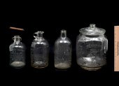 4 PC. GLASS JUGS & STORE DISPL
