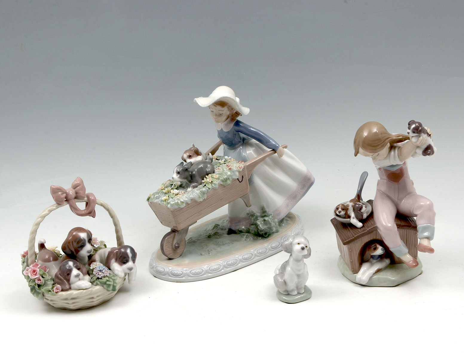 4 PC. LLADRO PORCELAIN DOG