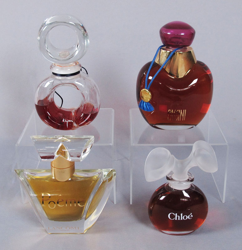 4 PERFUME FACTICE BOTTLES: