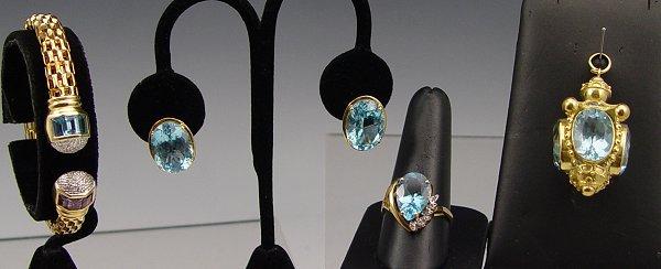 4 PIECE GOLD AND TOPAZ JEWELRY: