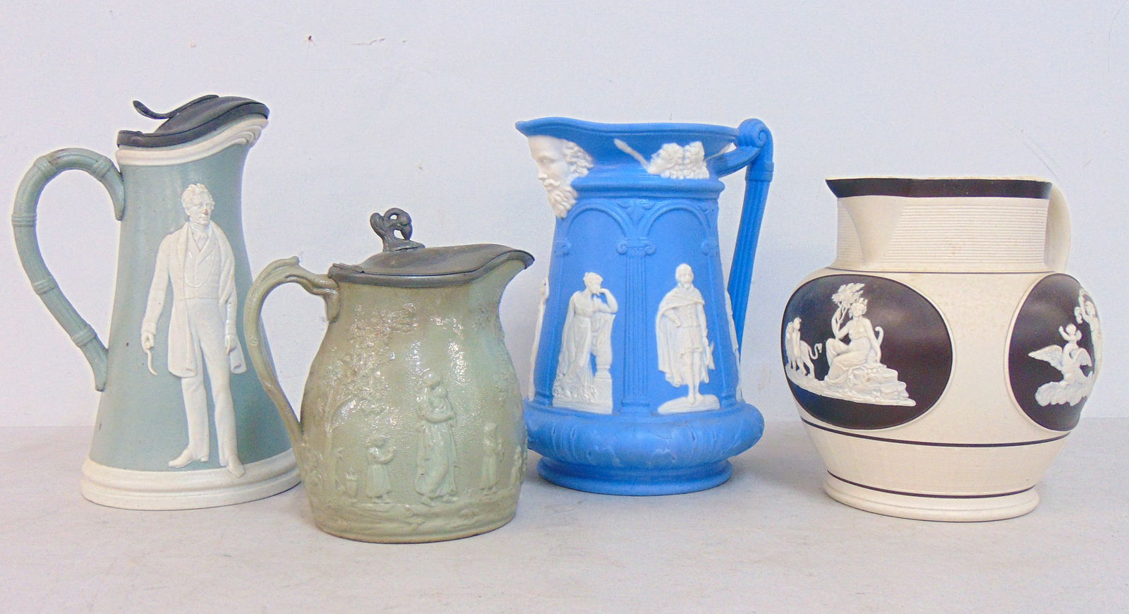 4 PITCHERS, 3 WEDGWOOD STYLE 19TH