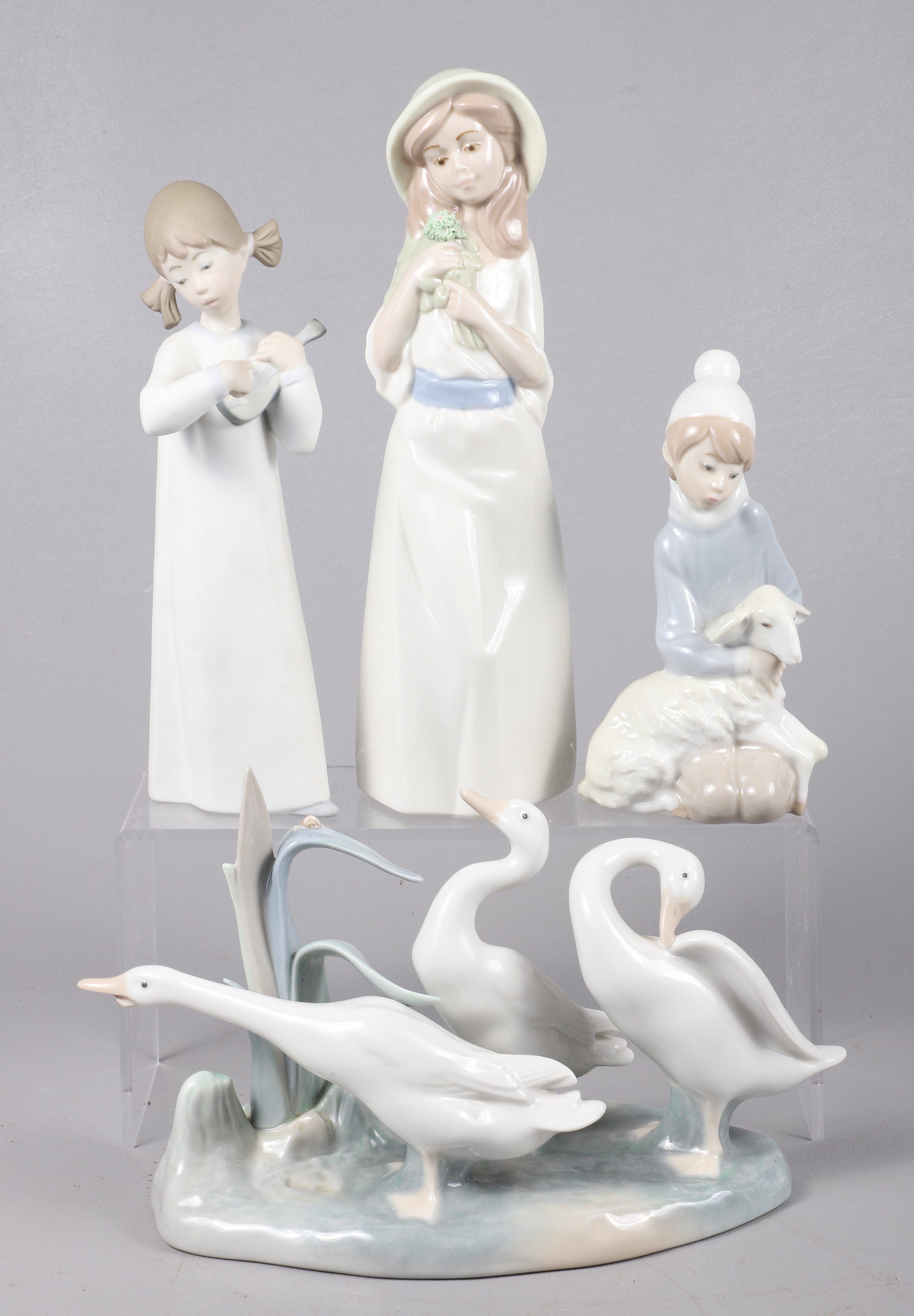 (4) Spanish porcelain figurines,