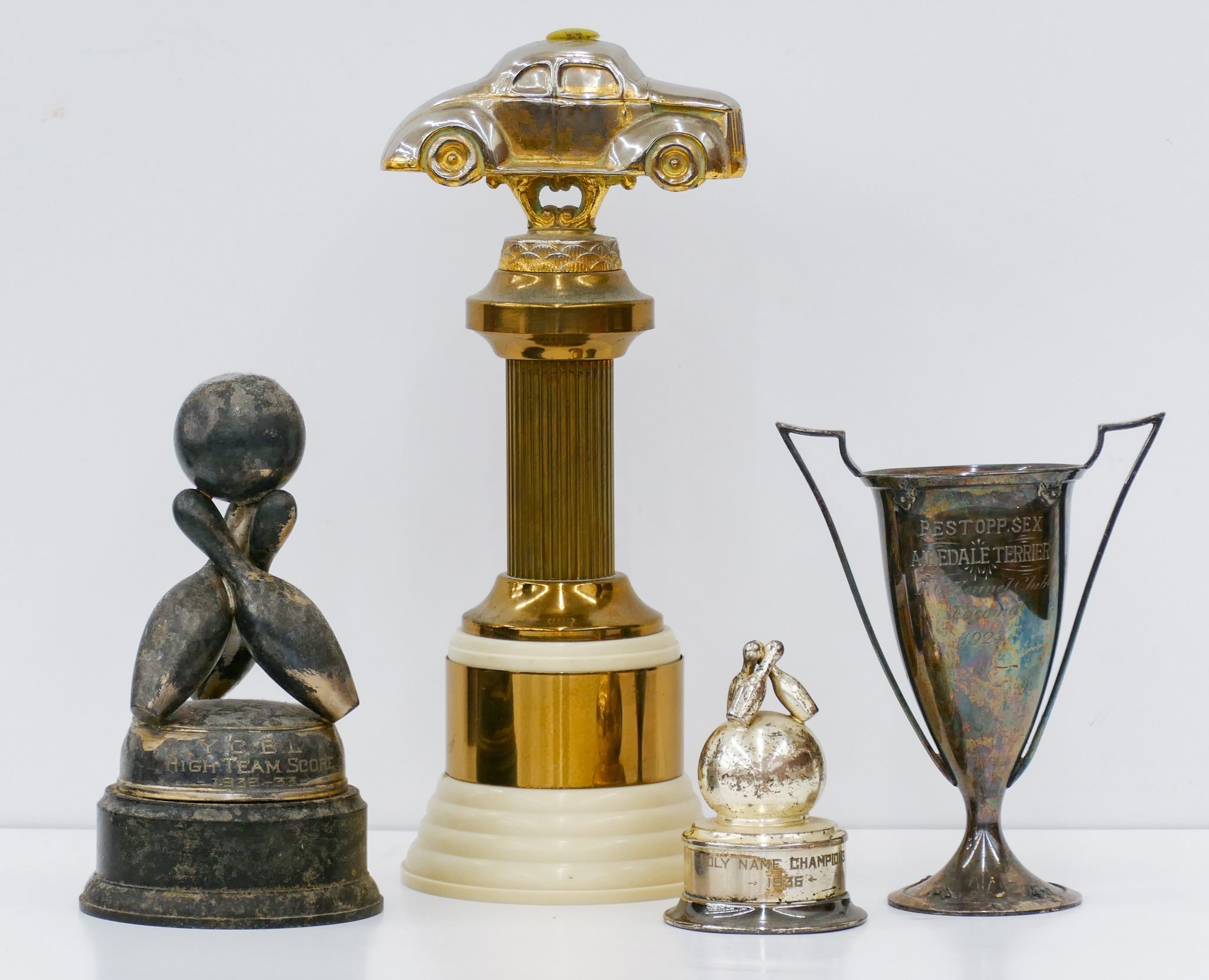 4pc Assorted Trophies Largest 12''