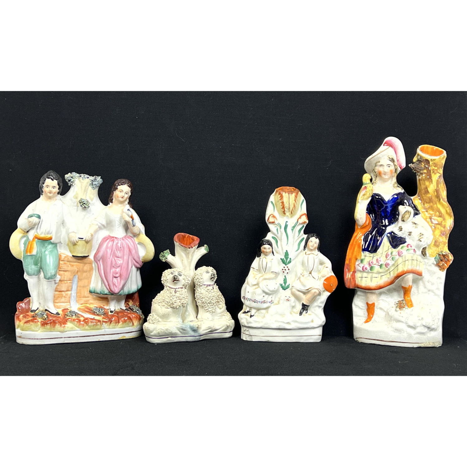 4pc Staffordshire spill vases.