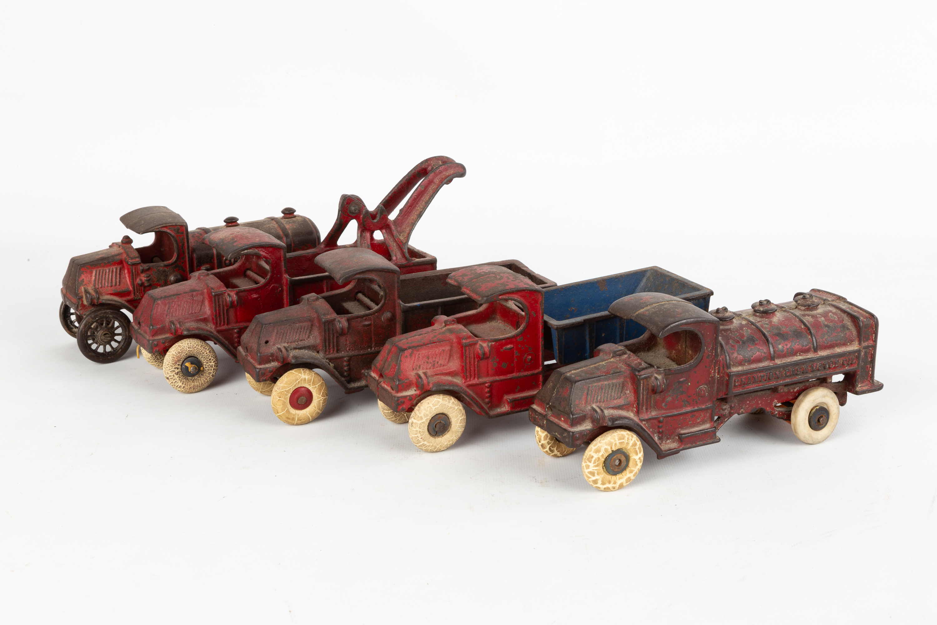 (5) CAST IRON TOY TRUCKS Early 20th