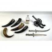 5 horns 2 daggers and bottle O
